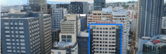 An office tower in Prishtina marked up as an AS Real Estate listing