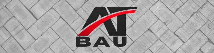AT BAU logo over grey herringbone paving, from the homepage built for the firm